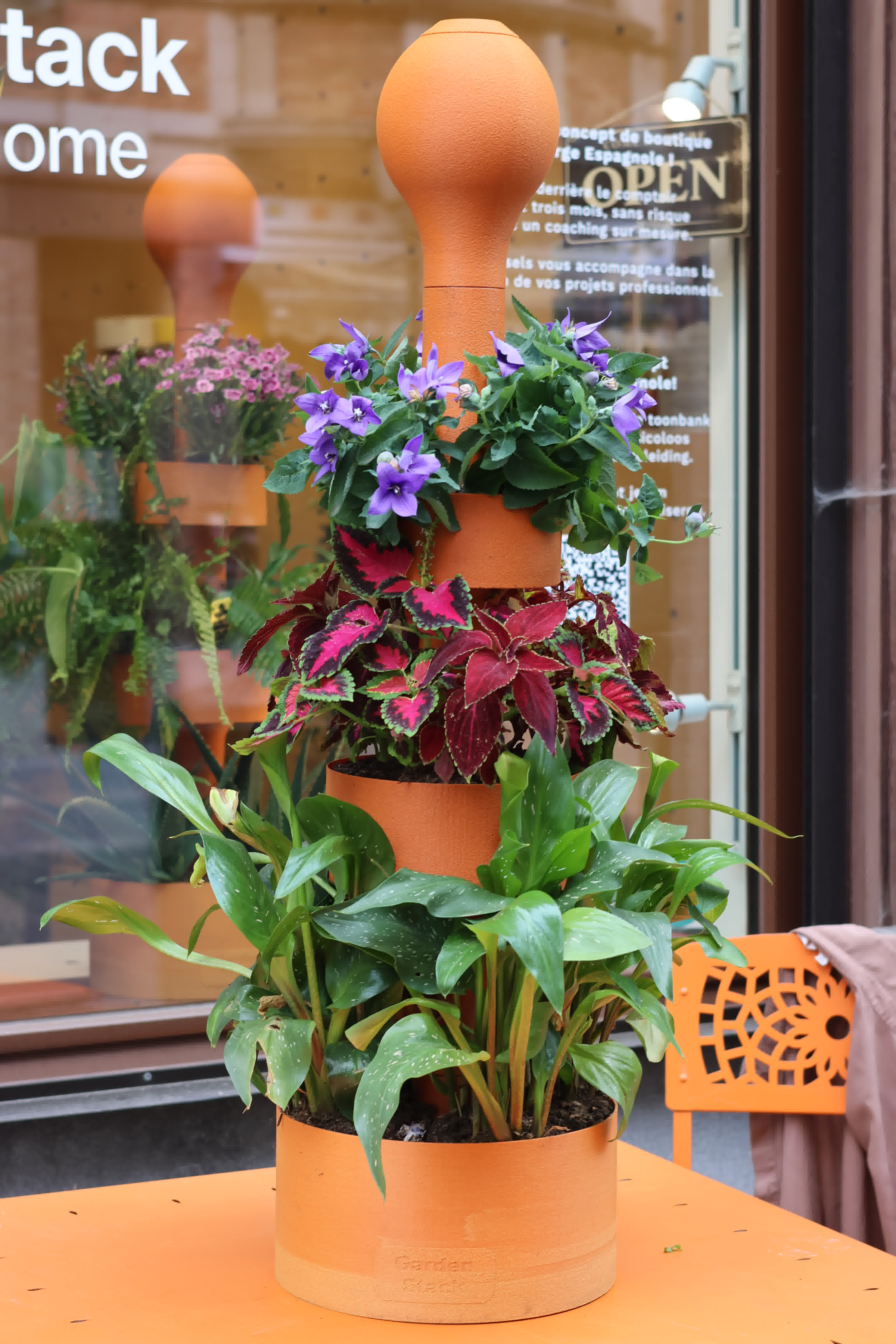 Terracotta self-watering planter